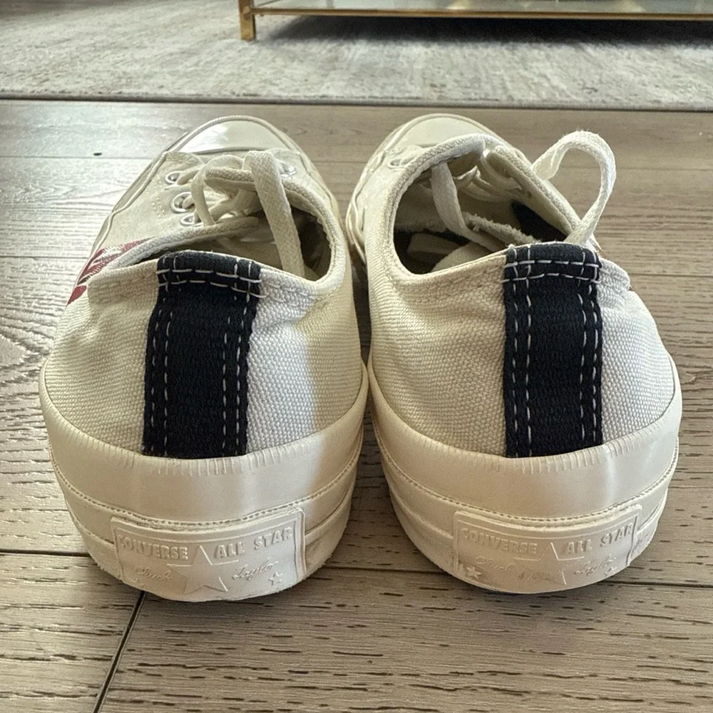 Comme Des Garçons Converse Women’s White Canvas Sneakers with Red Heart Graphic